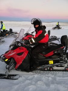 Jackie snowmobiling in Lapland